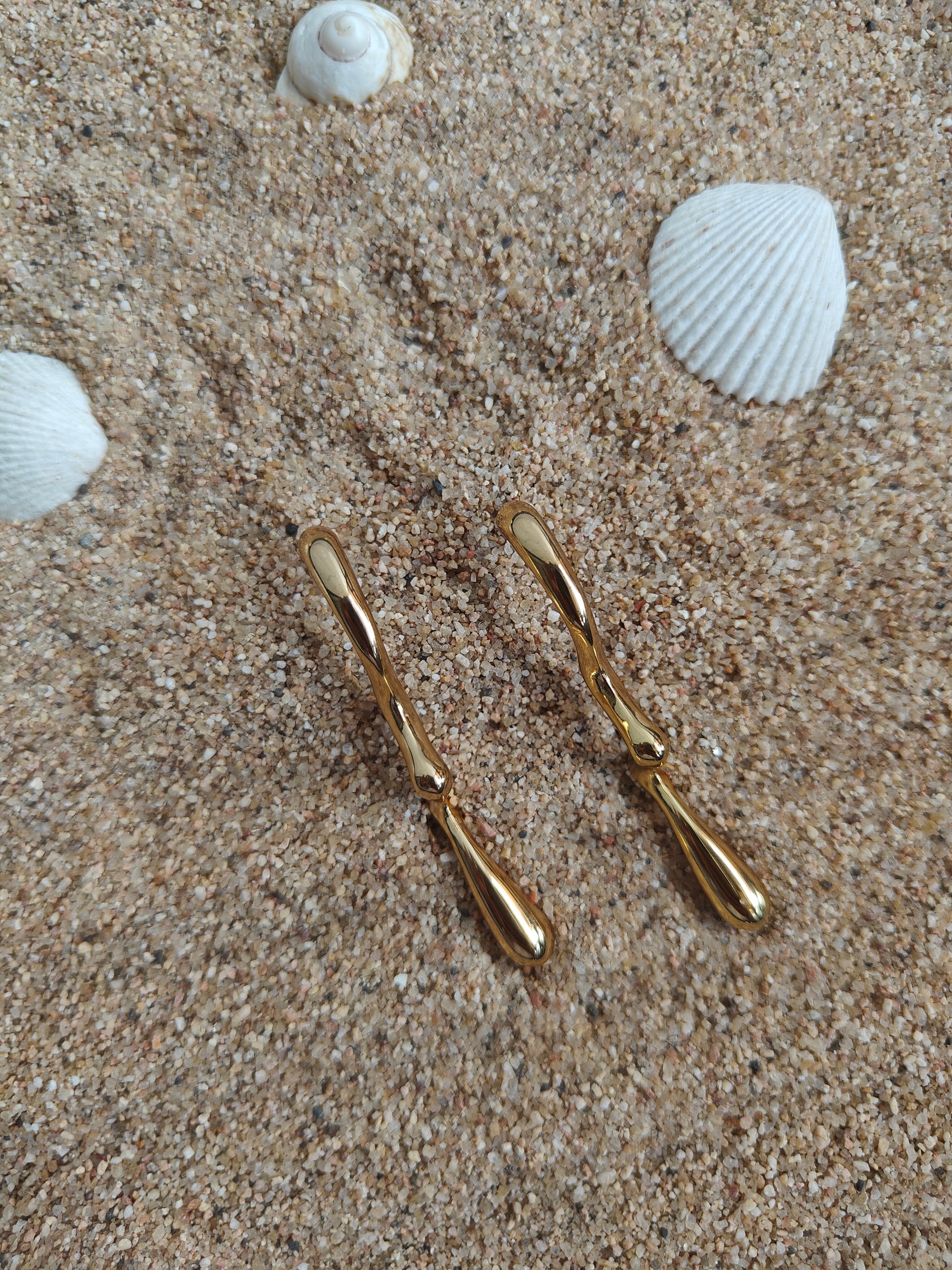 Amuukta 18K Gold Wavy Statement Earrings