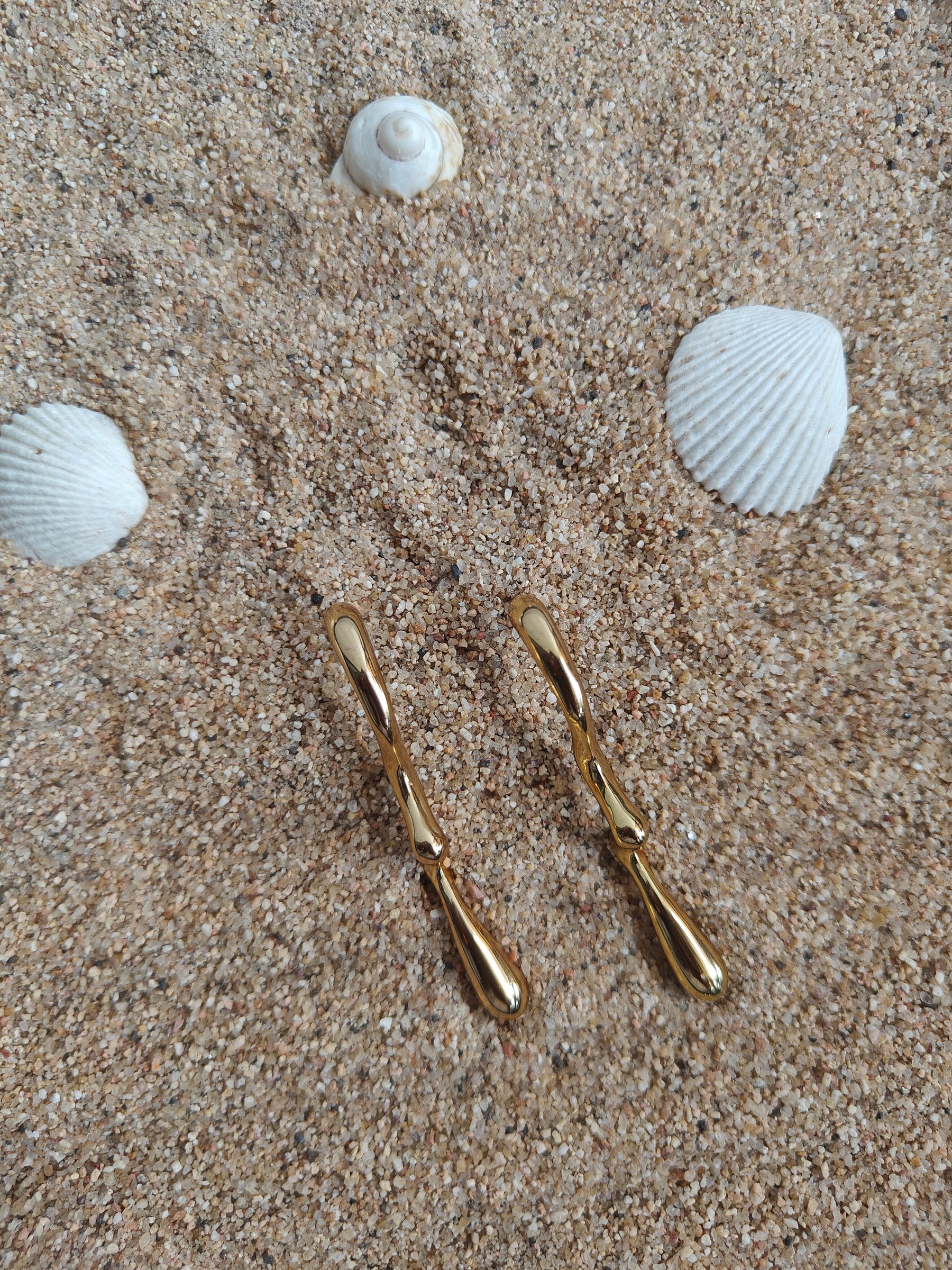 Amuukta 18K Gold Wavy Statement Earrings