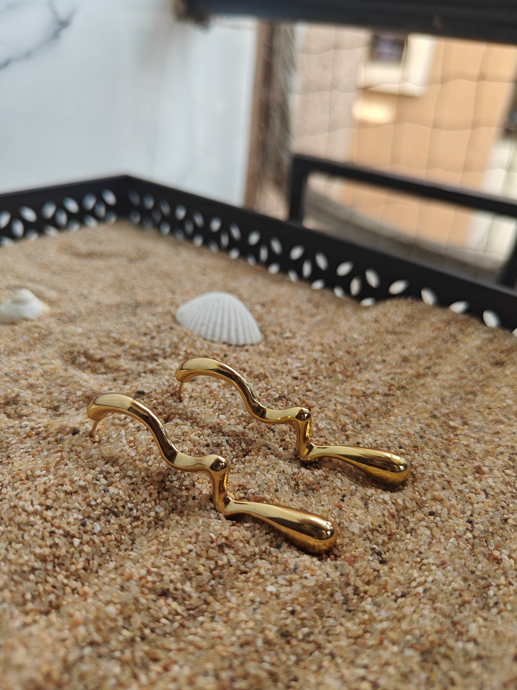 Amuukta 18K Gold Wavy Statement Earrings