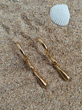 Amuukta 18K Gold Wavy Statement Earrings