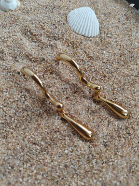 Amuukta 18K Gold Wavy Statement Earrings